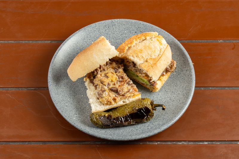 Classic Philly Cheesesteak Hoagie with peppers and onions
